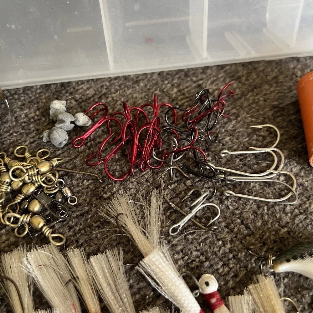 Plano Tackle Box Lot with Rebel Lure Bucktail Jigs Hooks Swivels and Hand Reel